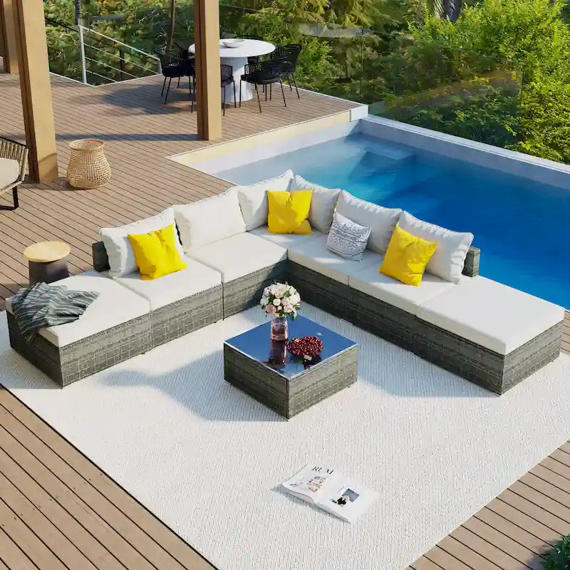 Ensemble de canapé d'extérieur modulaire moderne en résine tressée 8 pièces avec 1 table basse et 2 poufs, idéal pour les patios, les cours et les jardins.