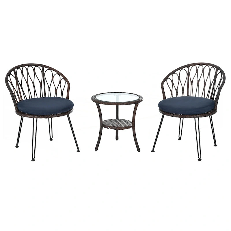 Deux chaises individuelles en rotin avec une table ronde en verre