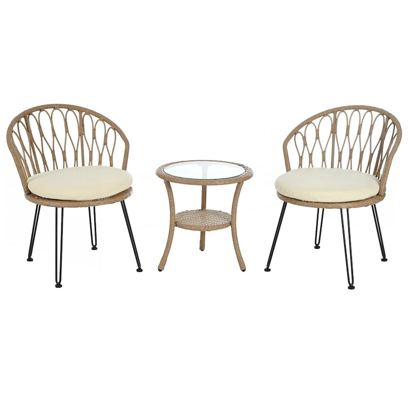 Deux chaises individuelles en rotin avec une table ronde en verre