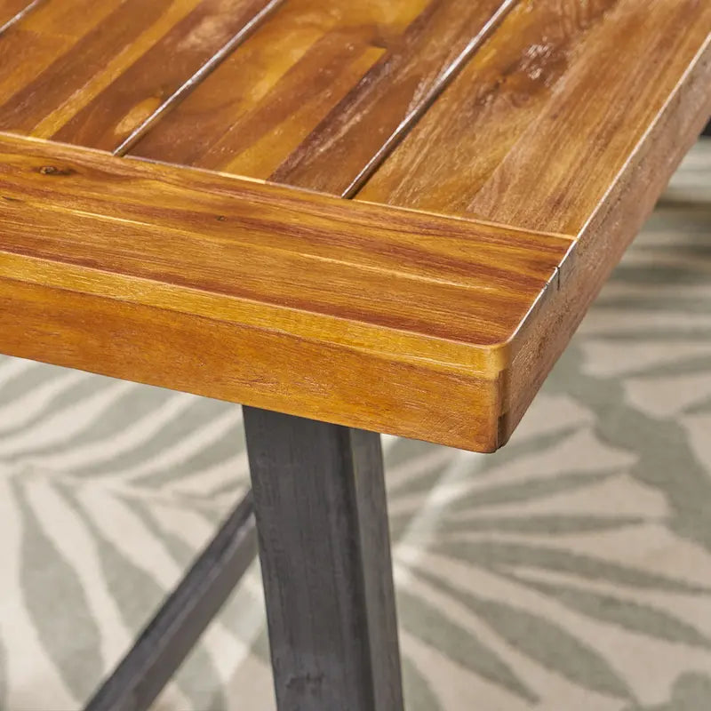 Ensemble de salle à manger d'extérieur 7 pièces en bois d'acacia : table rectangulaire avec 6 coussins amovibles et chaises avec accoudoirs.