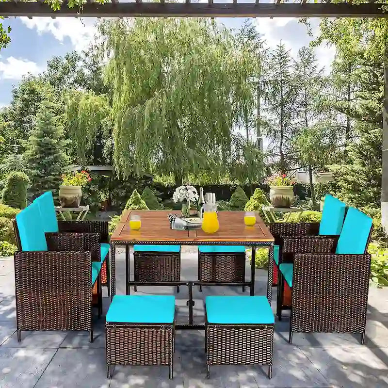 Ensemble de salle à manger d'extérieur Costway 9 pièces en rotin, comprenant chaises rembourrées et pouf en bois - Voir les détails