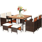 Ensemble de salle à manger d'extérieur Costway 9 pièces en rotin, comprenant chaises rembourrées et pouf en bois - Voir les détails