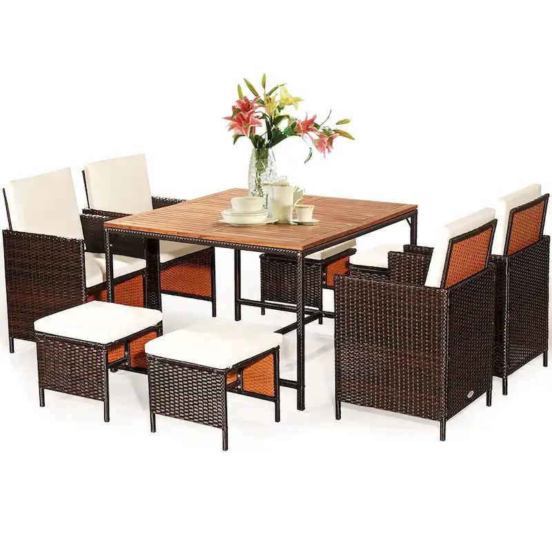 Ensemble de salle à manger d'extérieur Costway 9 pièces en rotin, comprenant chaises rembourrées et pouf en bois - Voir les détails