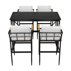 Ensemble de salle à manger d'extérieur 5 pièces en fer avec 4 chaises et coussins amovibles. Table et chaises modernes pour terrasse ou cour.