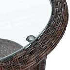 Ensemble de salle à manger d'extérieur 3 pièces comprenant une table basse ronde en verre avec étagère de rangement et 2 chaises en rotin avec coussins.