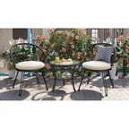 Ensemble de salle à manger d'extérieur 3 pièces comprenant une table basse ronde en verre avec étagère de rangement et 2 chaises en rotin avec coussins.