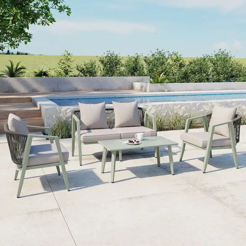 Ensemble de canapé d'extérieur en fer forgé 4 pièces avec table basse et coussins