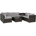 Ensemble de mobilier de jardin en rotin marron et gris 8 pièces comprenant 6 canapés, 1 table basse, un coffre de rangement et des coussins.