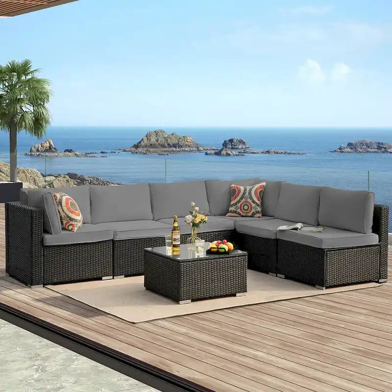 Ensemble de canapé d'extérieur 7 pièces en résine tressée noire avec coussins gris et table basse