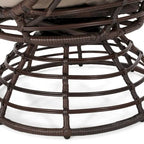 Fauteuil en osier Oaks Aura au design abstrait en maille, fauteuil pivotant en rotin tressé artisanal en forme d'œuf, fauteuil en forme de panier avec coussin