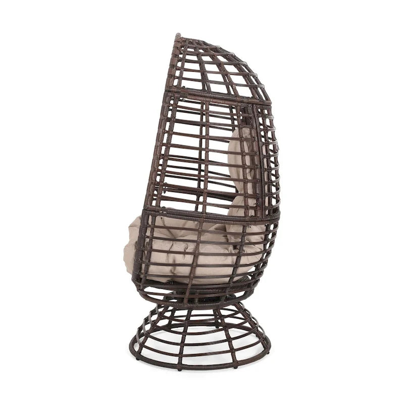 Fauteuil en osier Oaks Aura au design abstrait en maille, fauteuil pivotant en rotin tressé artisanal en forme d'œuf, fauteuil en forme de panier avec coussin